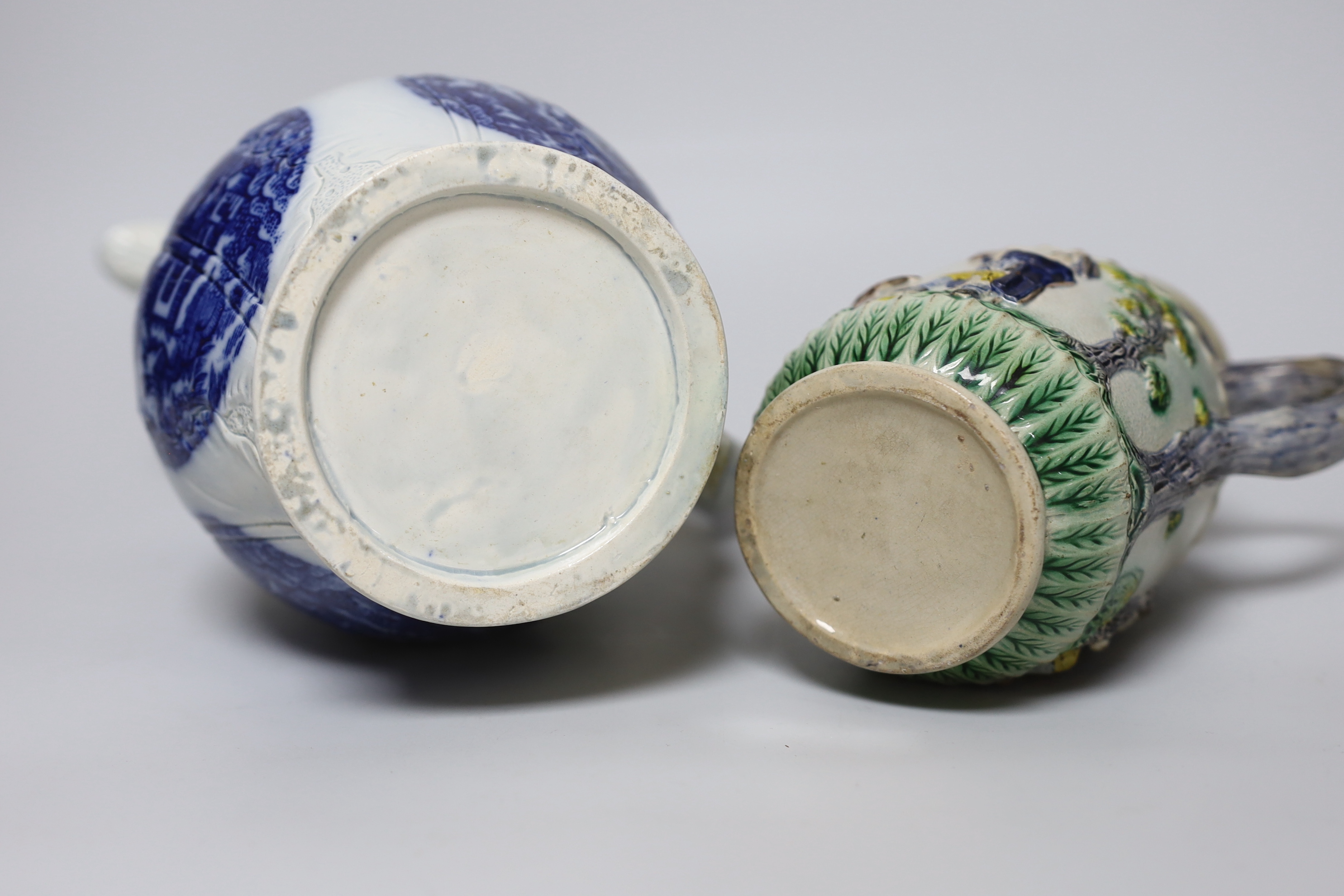A late 18th century blue and white pearlware jug, a chestnut basket and a Pratt type jug (3), 21.5cm high